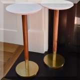 F08. Two West Elm “Mid-Century” drink tables with marble tops. 23”h x 10”w 